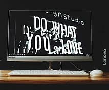 gray flat screen computer monitor turned-on