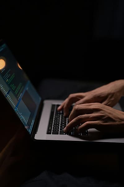 person-using-silver-and-black-laptop-computer